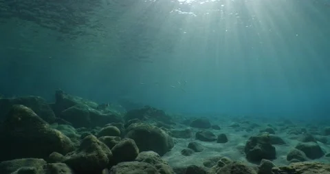 Sun ray and sun beam scenery underwater waves on surface ocean scenery Stock Footage 162169081
