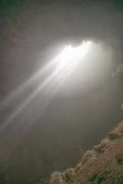 Sun ray falling into Jomblang Cave, Central Java, Indonesia Stock-Fotos