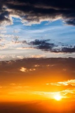 Sun ray is go down and amazing dramatic  orange cloud, twilight sky Stock Photos
