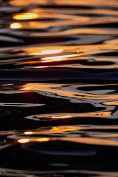  sun ray relection on water surface sun ray relection on water surface Cop... Stock Photos