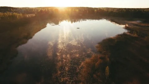 The sun ray seen on the river in Finland Stock Footage 76881879