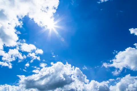 Sun rays and blue sky Stock Photos