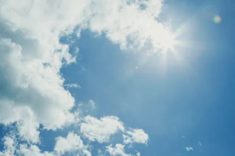 Sun rays and blue sky Stock Photos