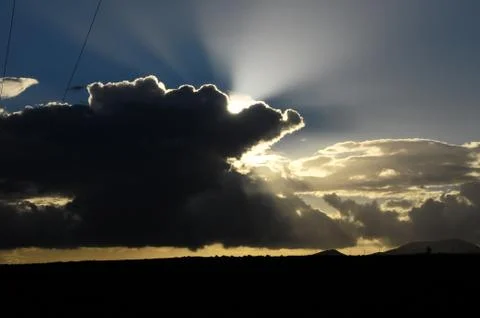 Sun rays and clouds Stock-Fotos