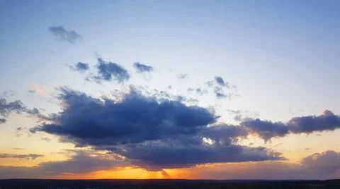 Sun Rays and Clouds Stock Photos