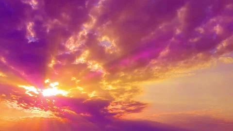sun rays and nice cumulus clouds sunrise... | Stock Video | Pond5