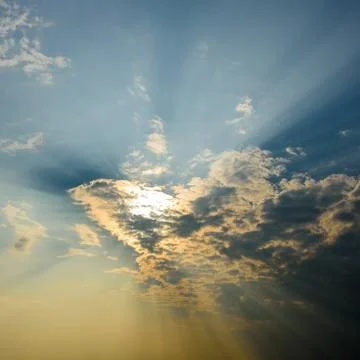 Sun rays are striking through the clouds Foto stock