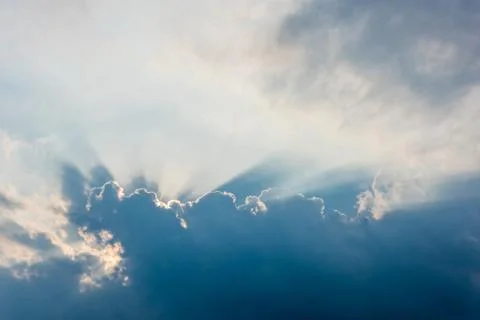 Sun rays are striking through the clouds Fotos Stock
