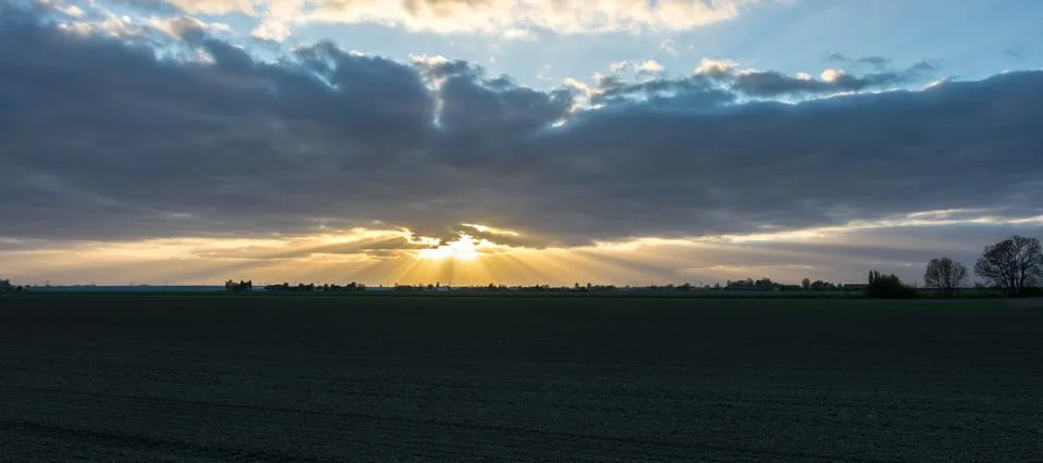 Sun Rays below a Cloud Bank Stock Photos