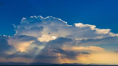 Sun rays on blue sky Stock Photos