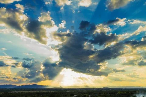 Sun rays on blue sky Stock Photos