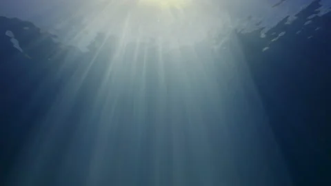 Sun rays in blue water, waves on the water surface, abstract Stock-Footage 143547436