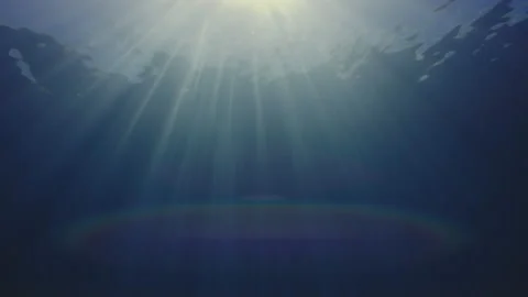 Sun rays in blue water, waves on the water surface, abstract Stock Footage 143547691