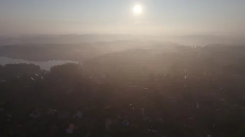 Sun Rays Break Through Foliage Fog of Trees. Early Morning Fog Rising up Ab.. Stock Footage 328124891