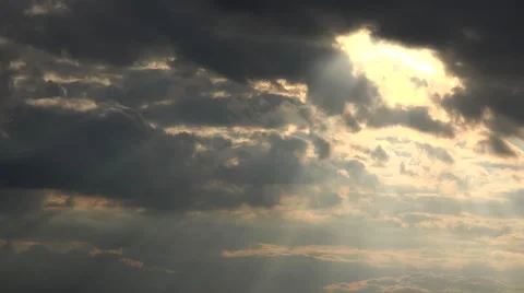 Sun rays breaking dark clouds, angry clo... | Stock Video | Pond5