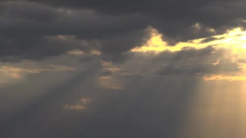 Sun rays breaking through clouds in the sky. Stock Footage 345669671