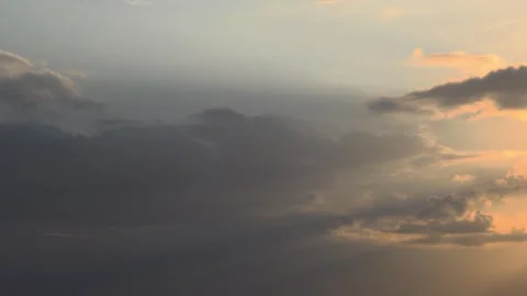 Sun rays breaking through clouds in the sky. Stock Footage 345669679