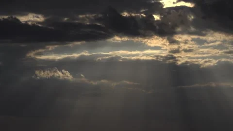 Sun rays breaking through clouds in the sky. Stock Footage 345669752