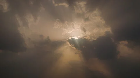 Sun Rays Breaking Through Dark Clouds Timelapse Sky Background Stock Footage 336035738