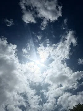 Sun Rays Breaking Through Dramatic Clouds Stock Photos