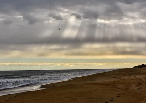 Sun Ray's coming throw clouds Stock Photos