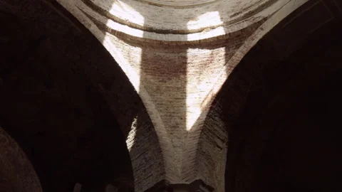Sun rays fall on the brick wall of an abandoned church Stock Footage 253223535