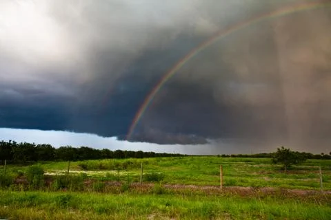 Sun-rays Give Way To Storm Rainbow 스톡 사진