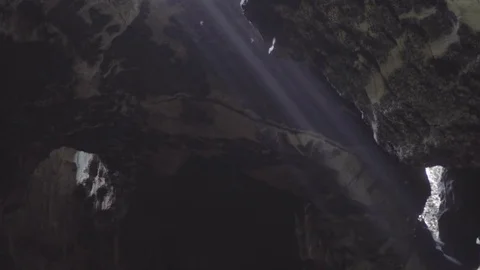 Sun rays in Gomantong cave slog2 Stock-Footage 82448118