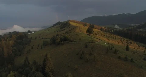 Sun rays illuminate the mountain Stock Footage 99150720