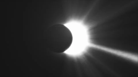 Sun rays of light, moon covering the sun during Total Solar Eclipse, Black Stock Footage 247684605