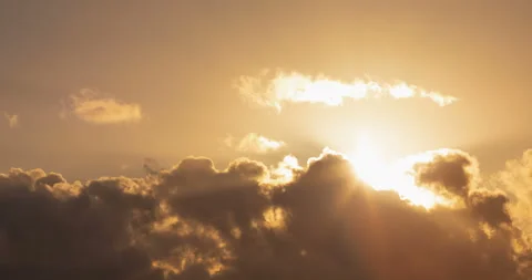 Sun rays over clouds time lapse Stock Footage 99374938