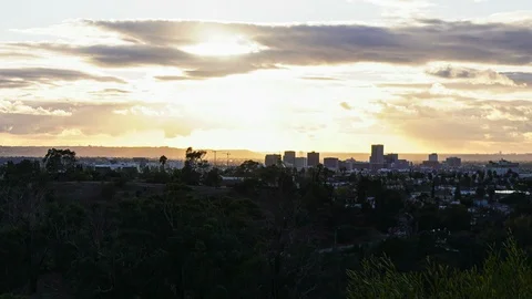 Sun rays over Mid City Los Angeles - Time lapse Stock Footage 127209492