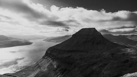 Sun rays over mountain B&amp;W 4k timelapse video. Faroe islands. Stock Footage 124005187