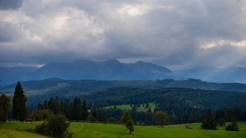 Sun rays over mountain landscape Stock Footage 95941121