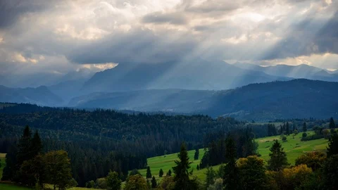 Sun rays over mountain landscape Stock Footage 95941142