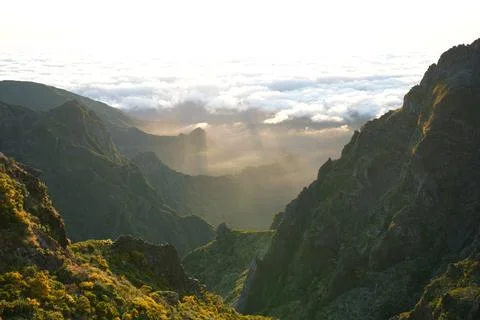 Sun Rays Over Mountain Valley and Sea of Clouds, Pico do Arieiro, Madeira Stock Photos