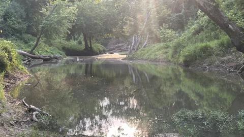 Sun Rays Over Quiet Forest Creek Near Kinta Oklahoma Stock Photos