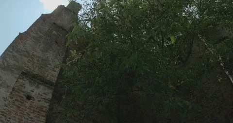 Sun Rays over Ruins of Castle Stock Footage 113764157