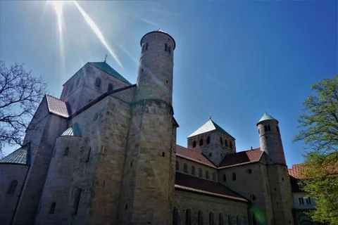 Sun rays over St. Michael's Church in Hildesheim Stock Photos