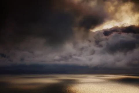 Sun rays on the sea Stock Photos