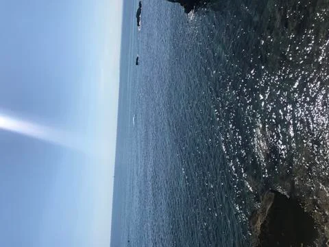 Sun rays to the sea Stock Photos