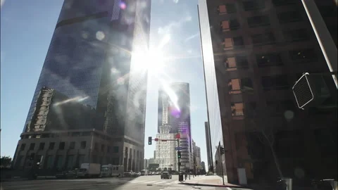 Sun rays shine next to modern skyscrapers in Downtown Los Angeles. Stock Footage 169401653