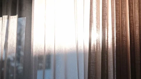 Sun rays shine through curtains Stock Footage 340124436