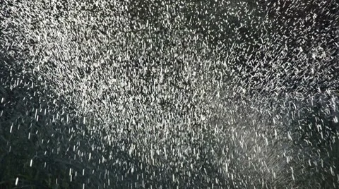 Sun rays shine through the sprayed water drops Stock Footage 7131529