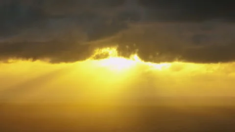 Sun Rays shing through dark clouds. piha, Auckland, New Zealand. Stock Footage 279965444