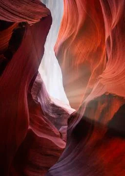 Sun rays shining the rocks in the inner canyon of Antelope Canyon Stock Photos