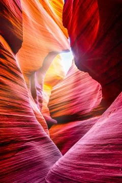 Sun rays shining the rocks in the inner canyon of Antelope Canyon Stock Photos