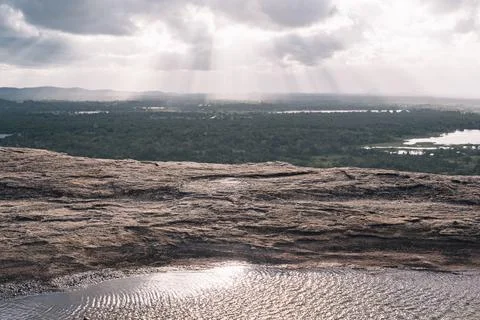 Sun rays shining through clouds over the landscape of Sri Lanka seen Stock-Fotos