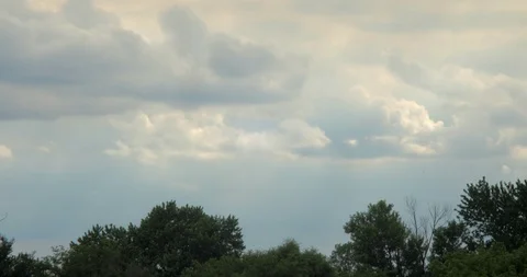 Sun Rays Shining Through Rolling Clouds Video stock 91945608