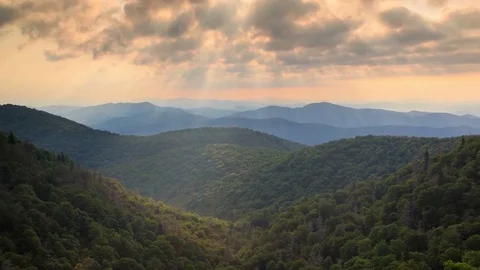 Sun rays shinning on the Blue Ridge Mountains of Asheville North Carolina Stock Footage 74114078